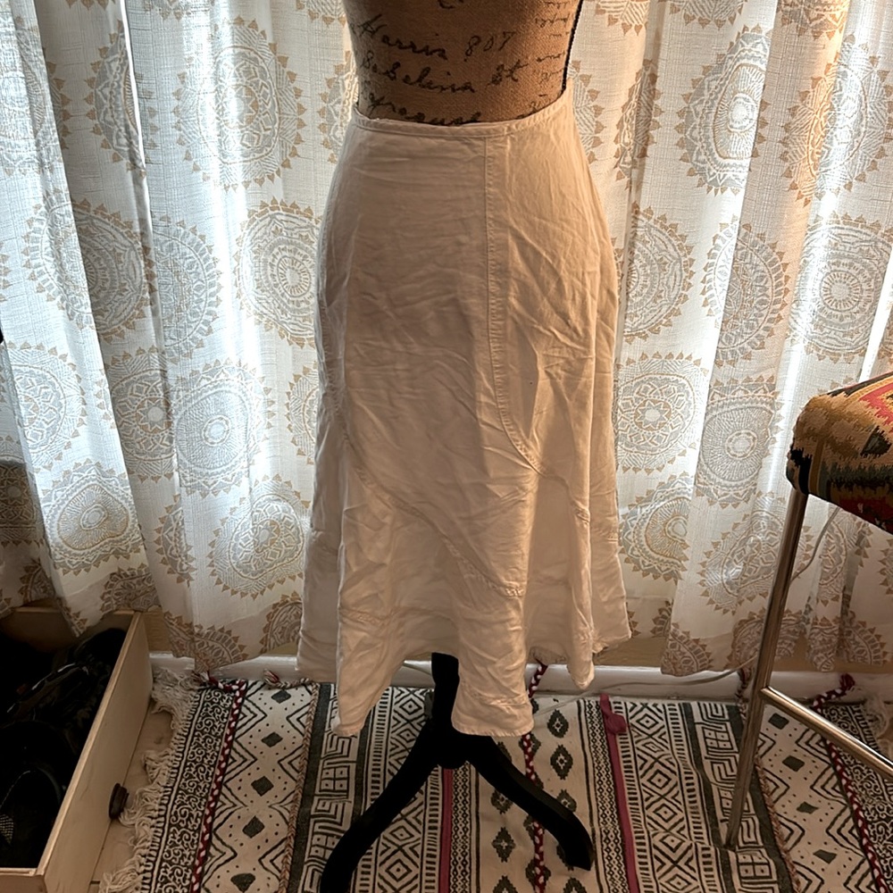White fully lined gently used BoHo hippie skirt.